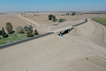 Overhead drone shot of Kent Avenue overpass from the side